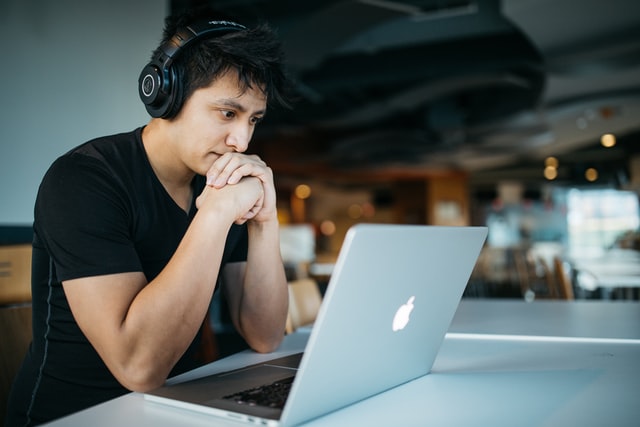 MacBook user working on Apple laptop