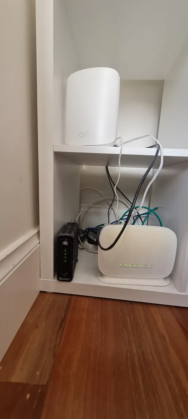 Original TP-Link router and Orbi mesh before upgrade